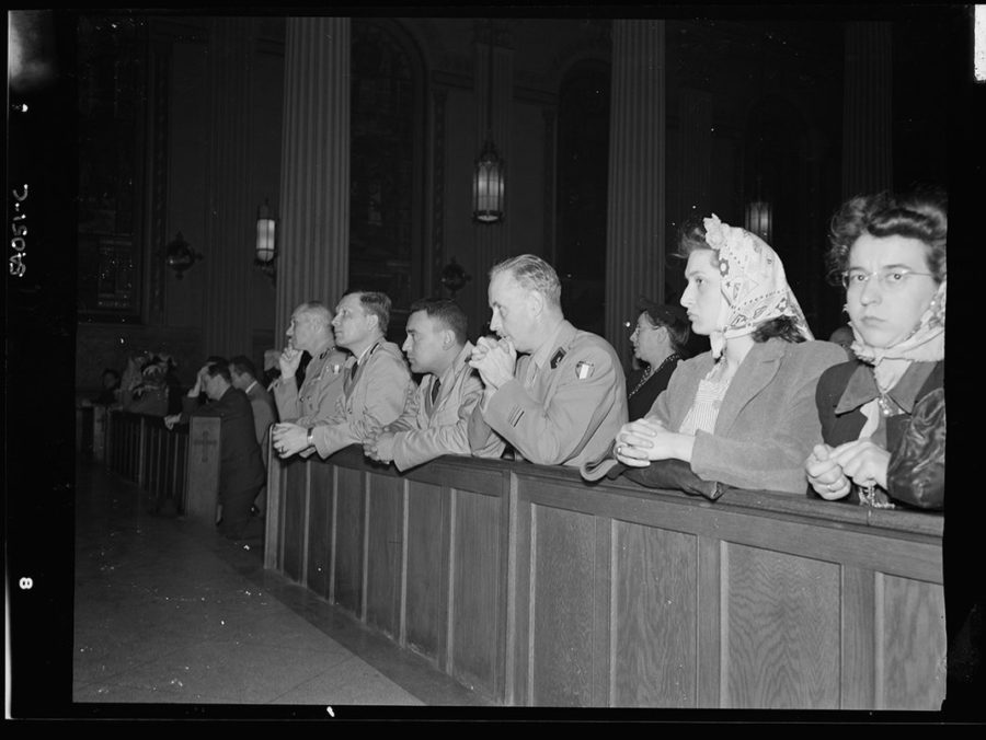 Noon Mass at St. Vincent de Paul’s Church, New York City. Office of War Information Photographic Collection, Library of Congress. June 6, 1944.